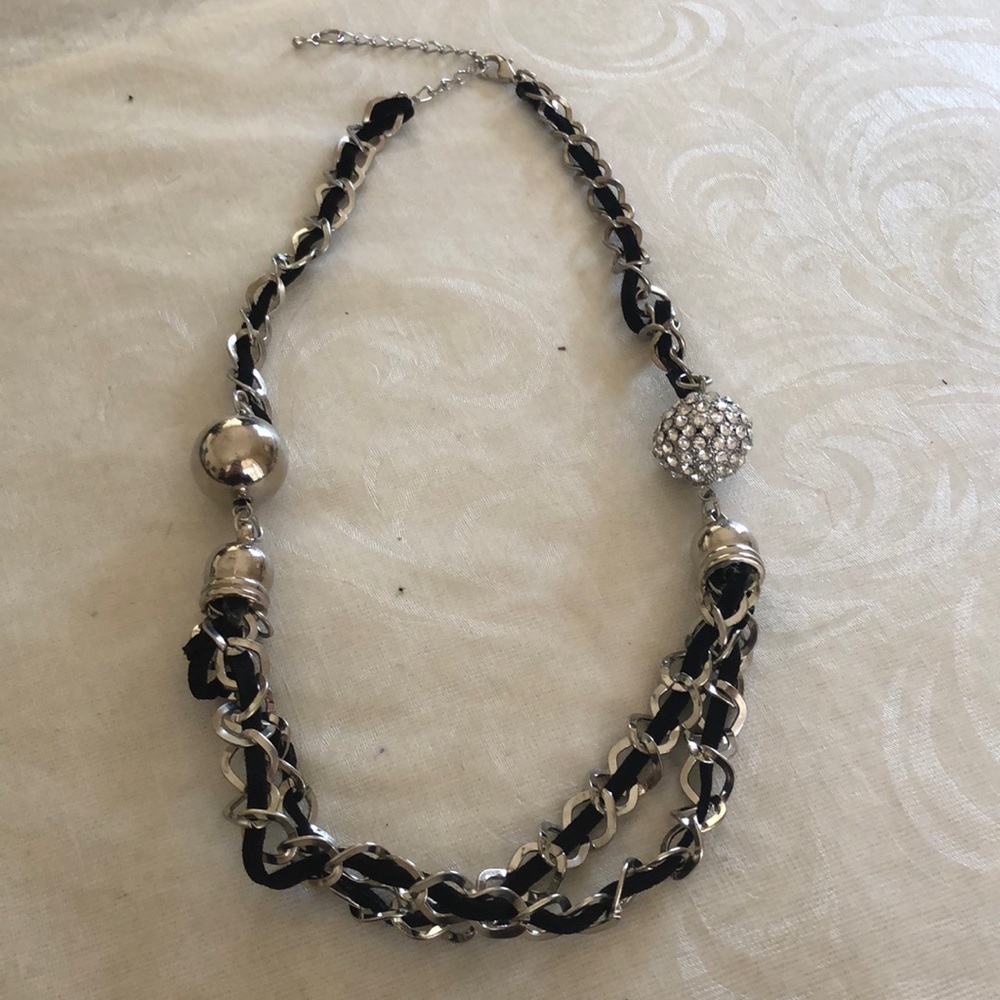 multi strand black color and silver tone necklace